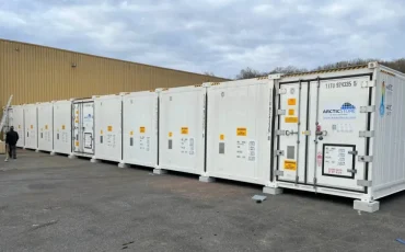 Modular cold storage container installation forming a SuperStore unit